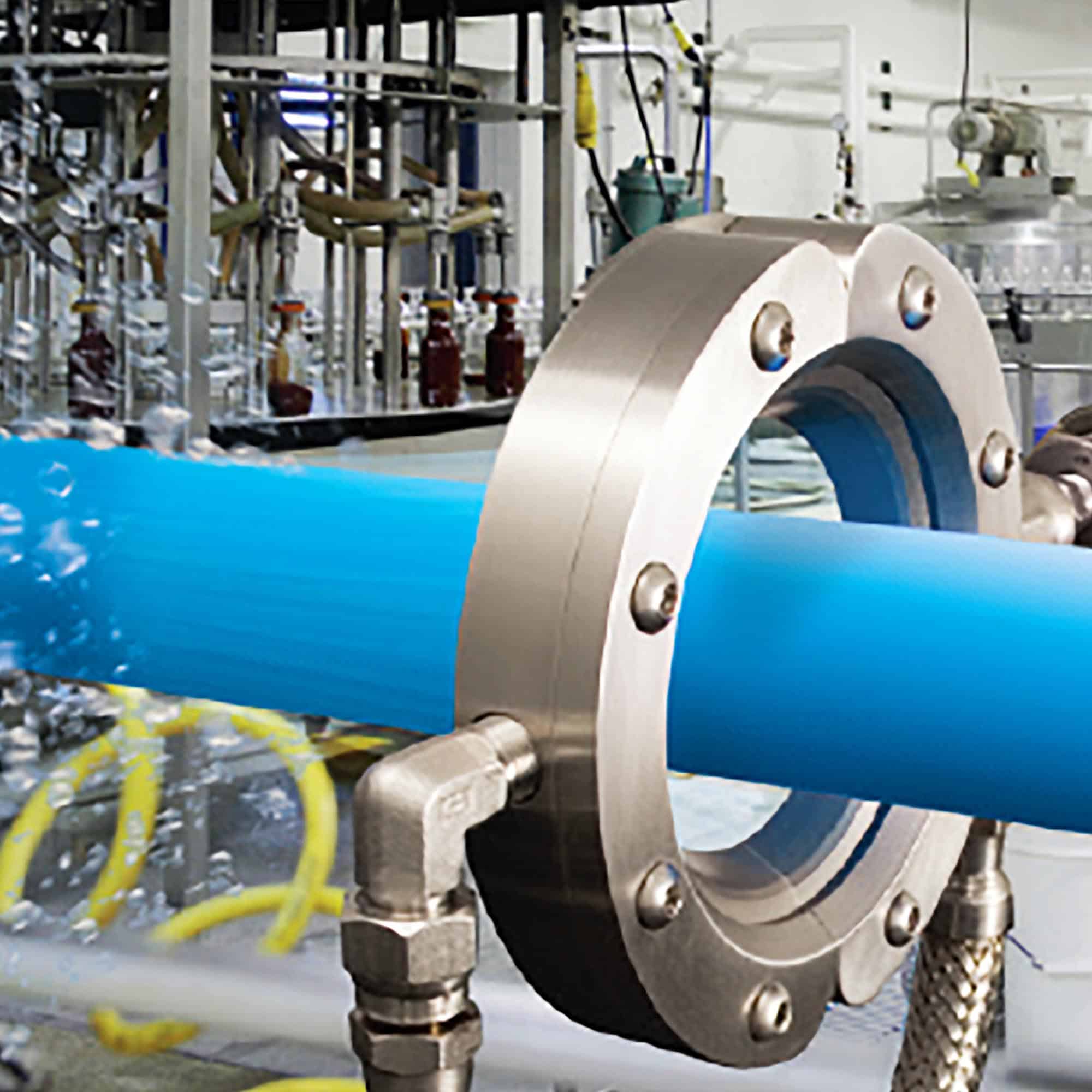 Exair - Air Wipe An Exair Air Wipe drying a pipe